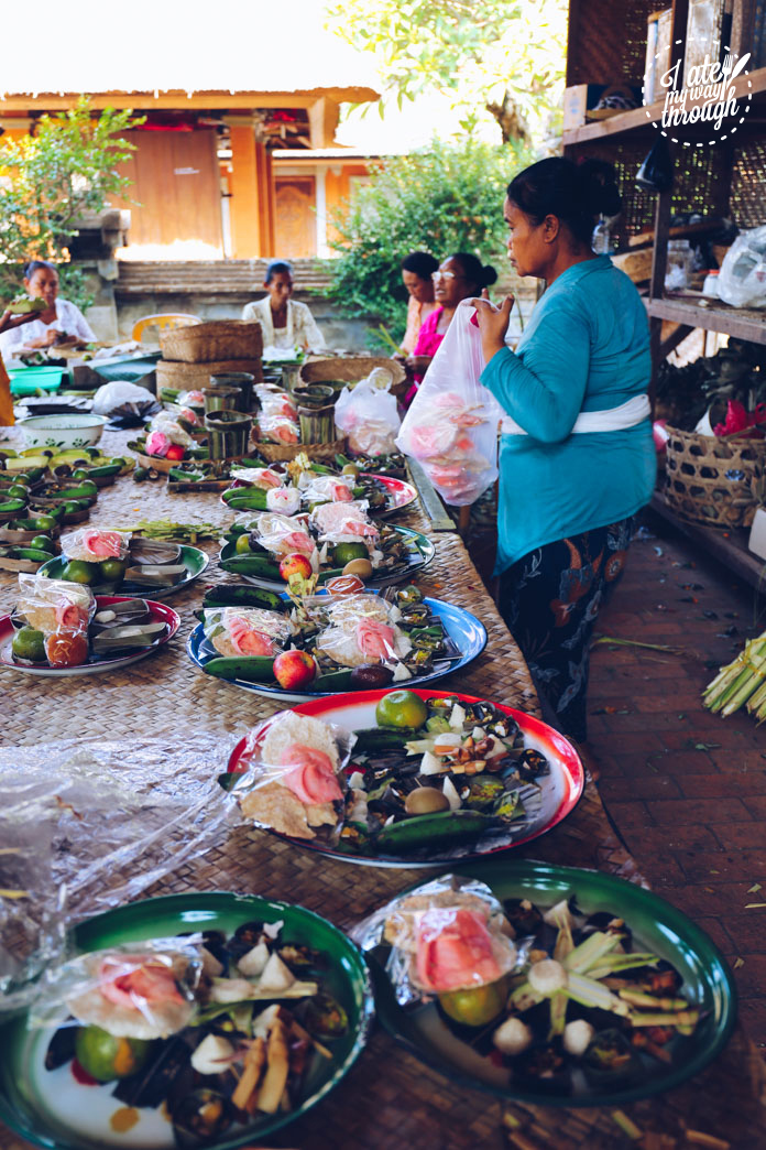 Local Balinese preparing offerings at the temple