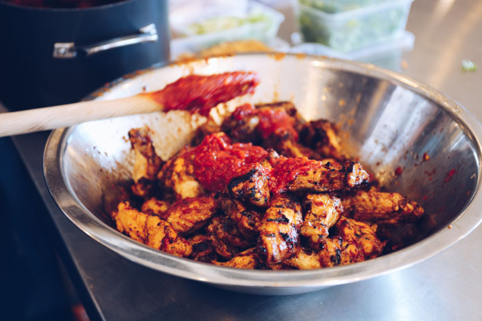 BBQ chicken wings tossed with smokey garlic sauce