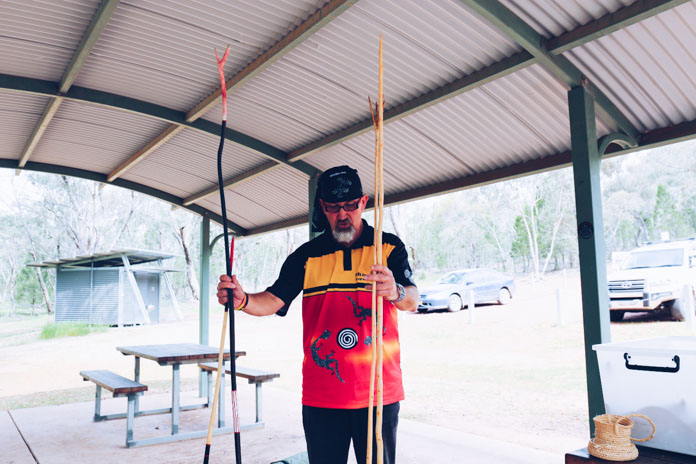 Mark Saddler sharing his hand-crafted Ngadhi gama (spears) traditional Aboriginal tools
